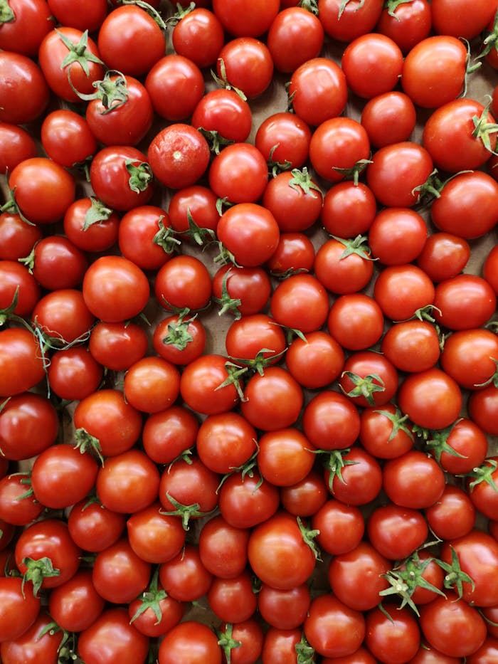 Top view of fresh, ripe cherry tomatoes, perfect for healthy cooking inspiration.